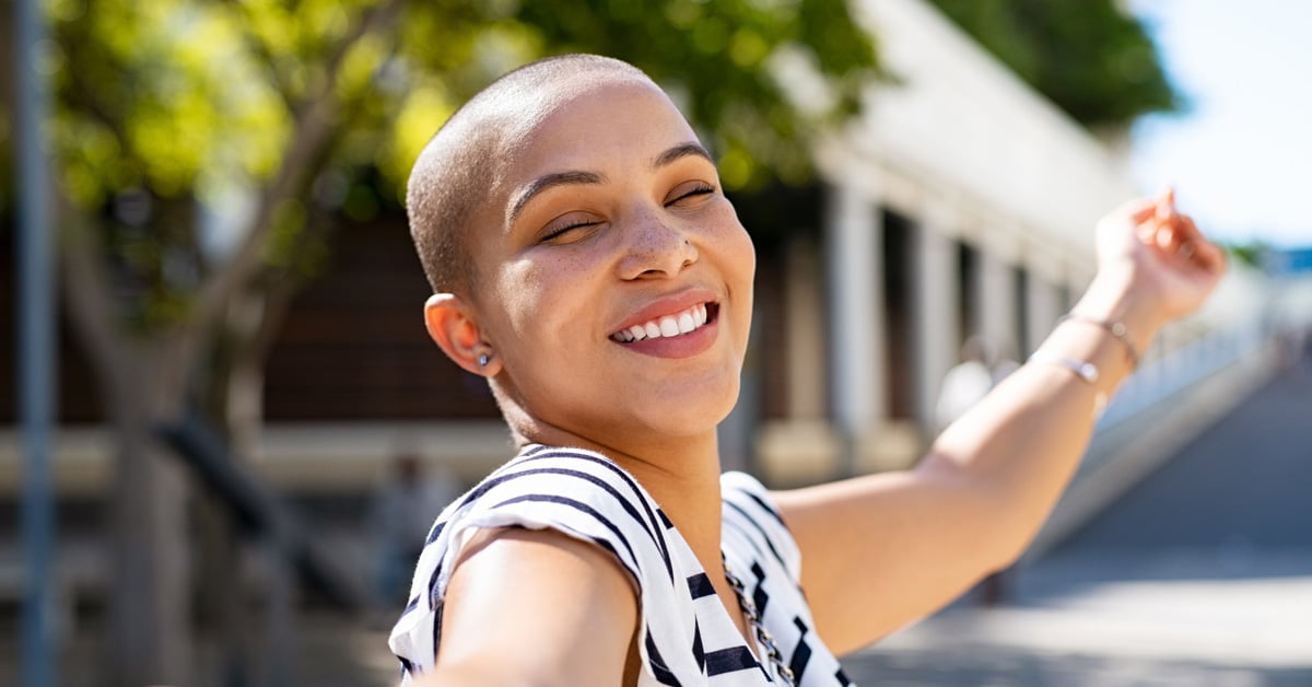 a person smiling for the camera