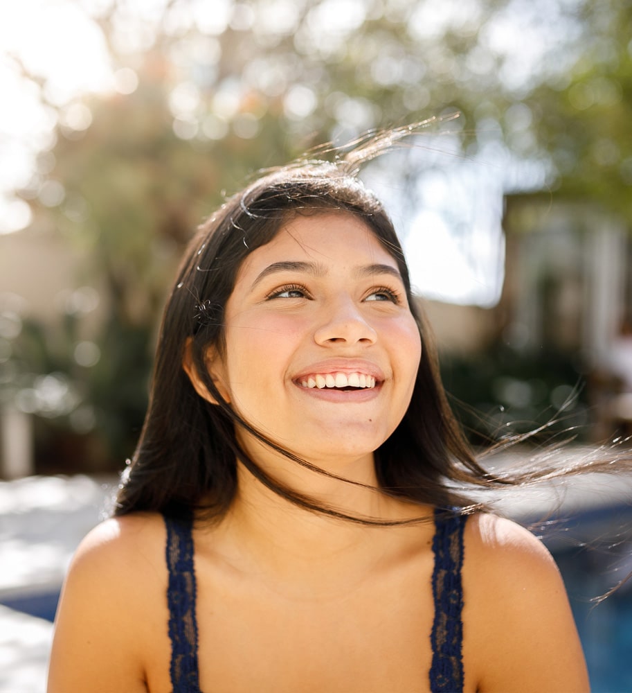 a woman smiling for the camera