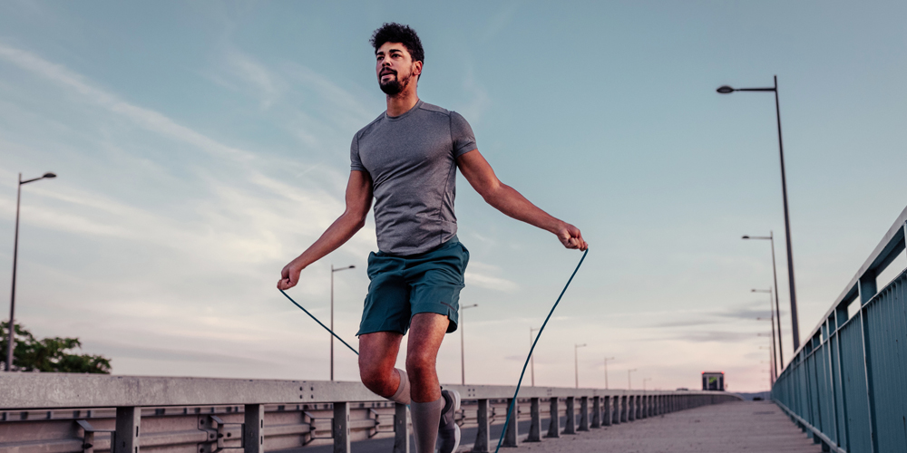 a man standing on a bridge
