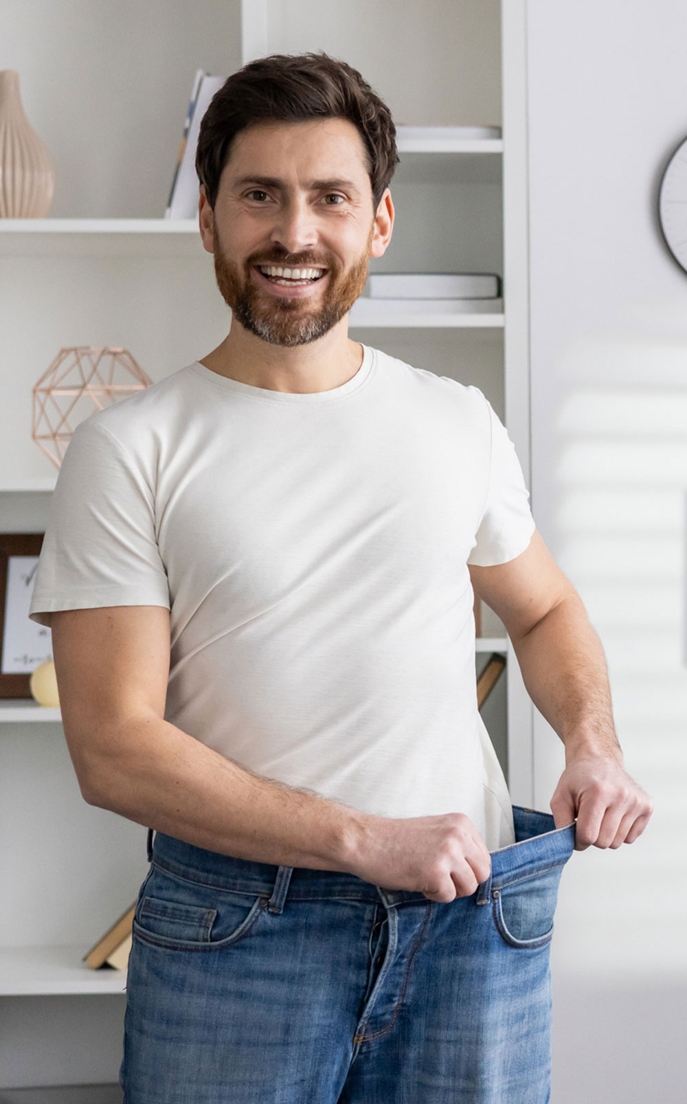 a man standing in front of a window