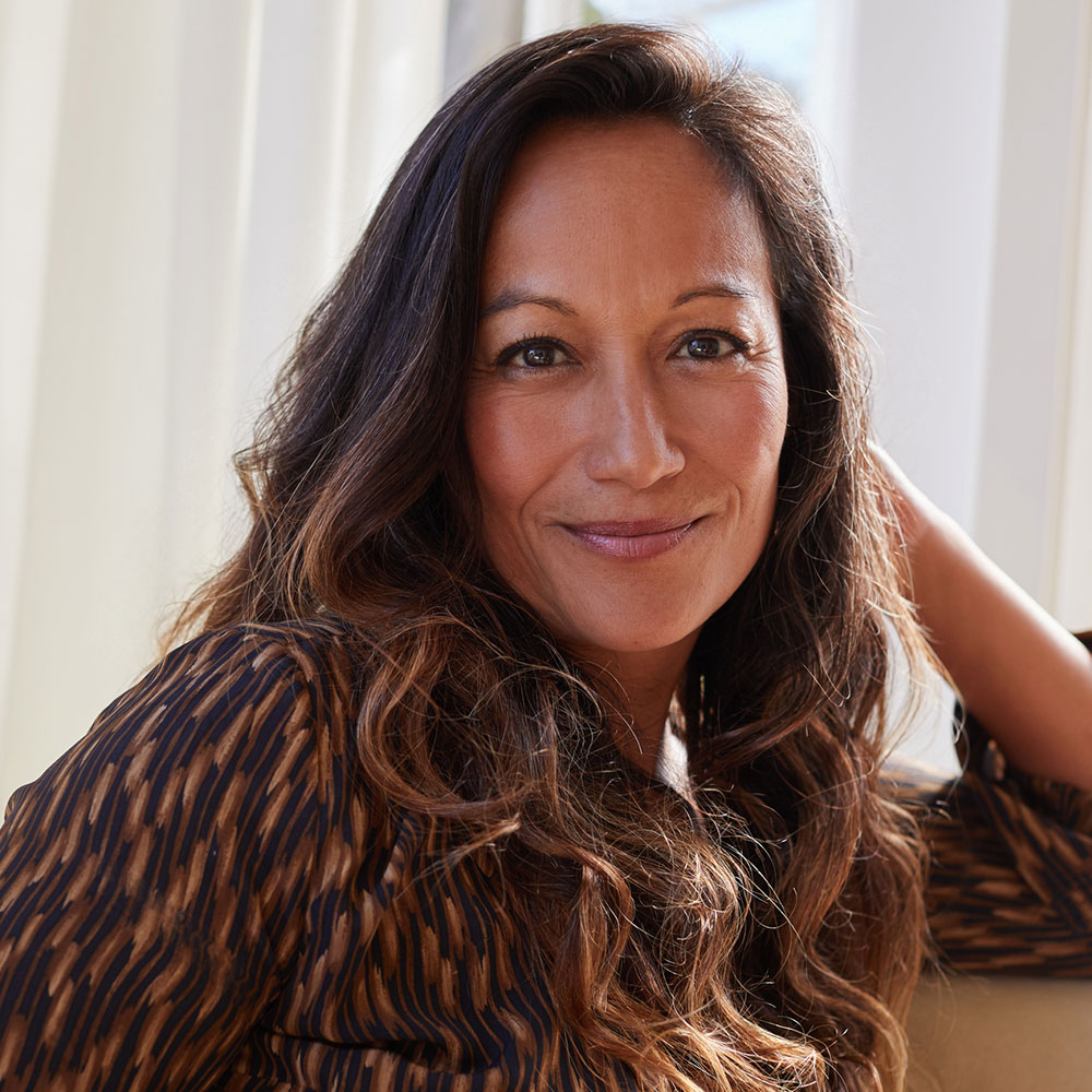 a woman smiling for the camera