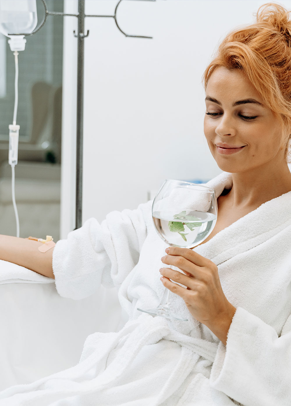 a woman holding a glass of wine