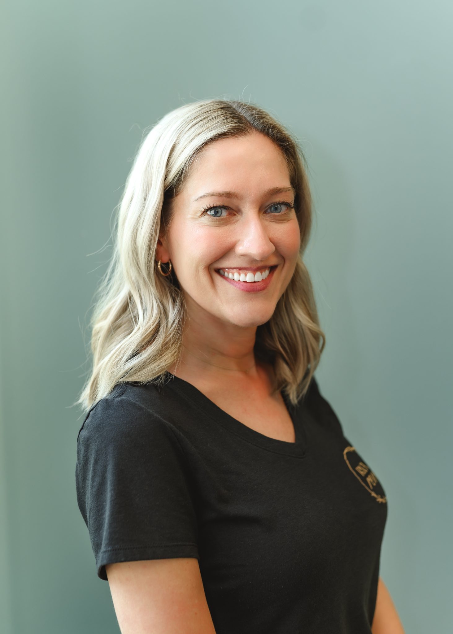a woman smiling for the camera